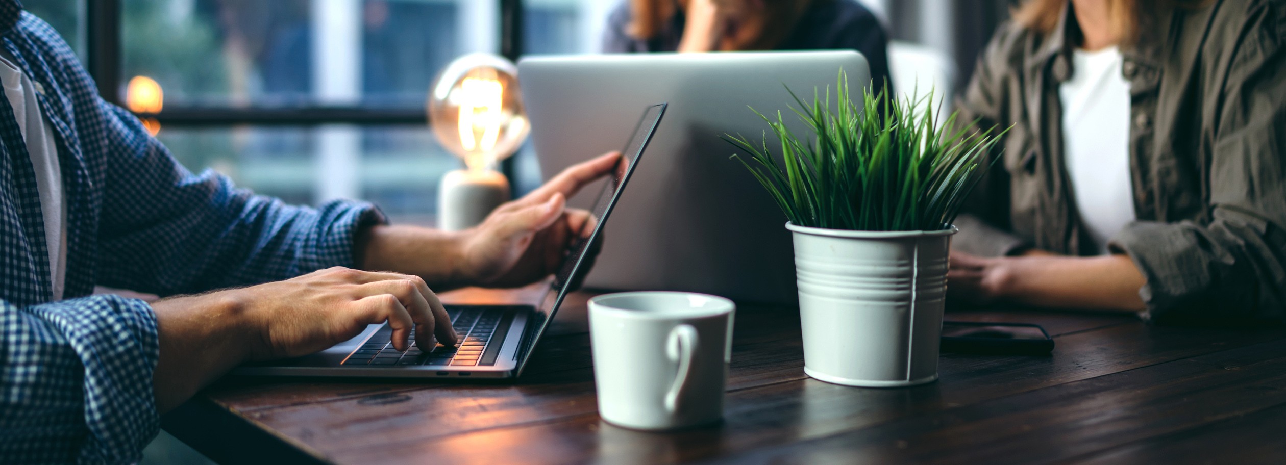 Baseline analysis image - creatives working on laptops